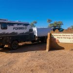 A 4WD towing a hybrid caravan parked next to the 