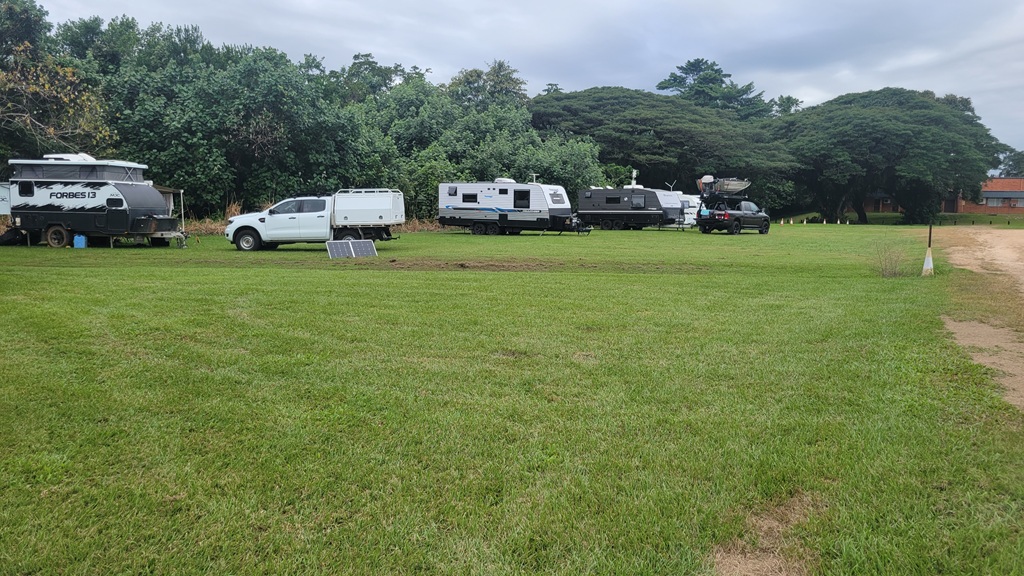 Caravans on the grassy area at Innisfail CMCA RV Park